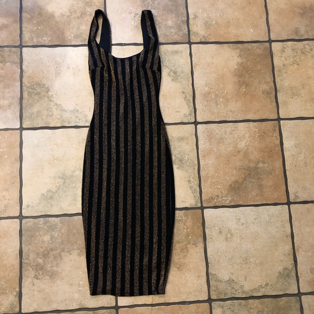 Fitted glitter black and gold dress